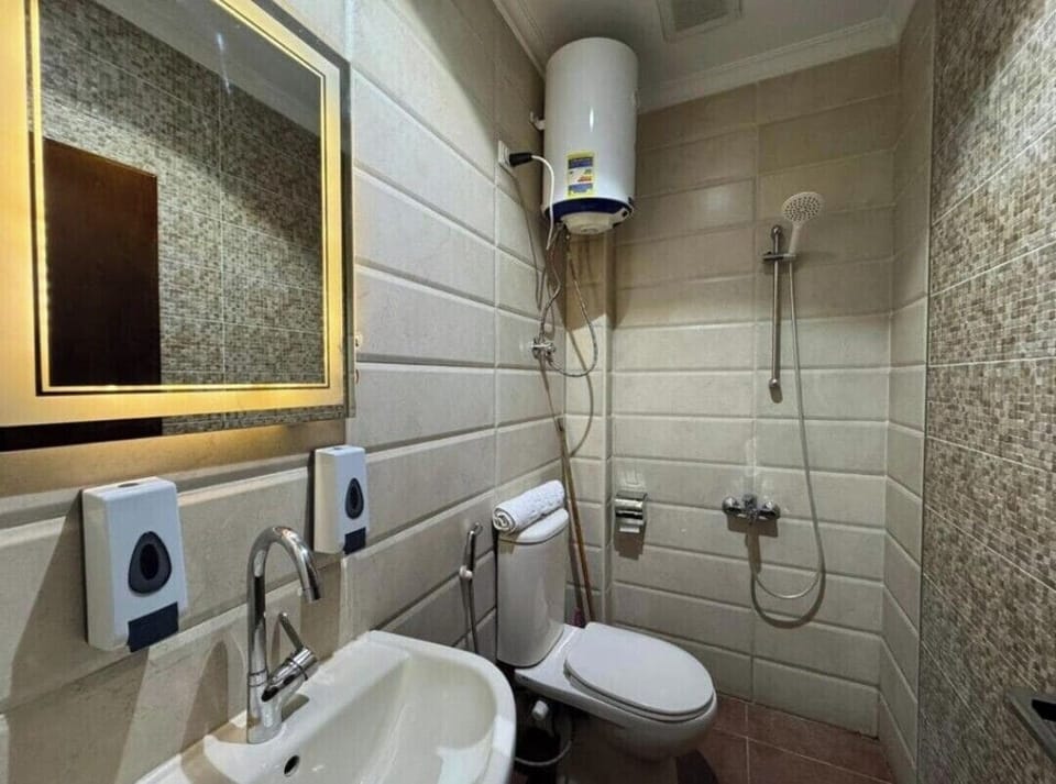 Shower, towels, soap, shampoo