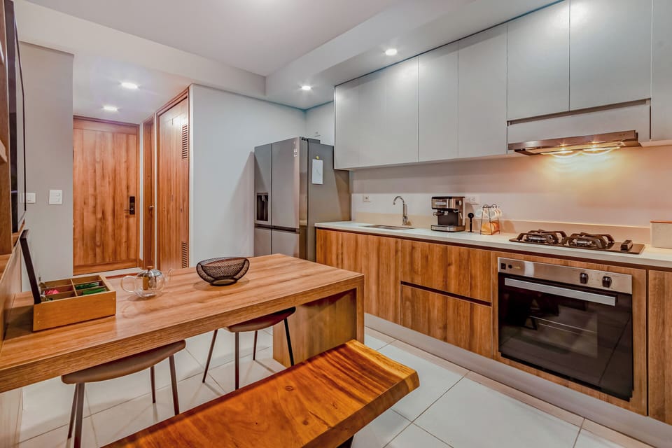 Deluxe Apartment, Balcony, Garden View | Private kitchen | Espresso maker, coffee/tea maker, electric kettle