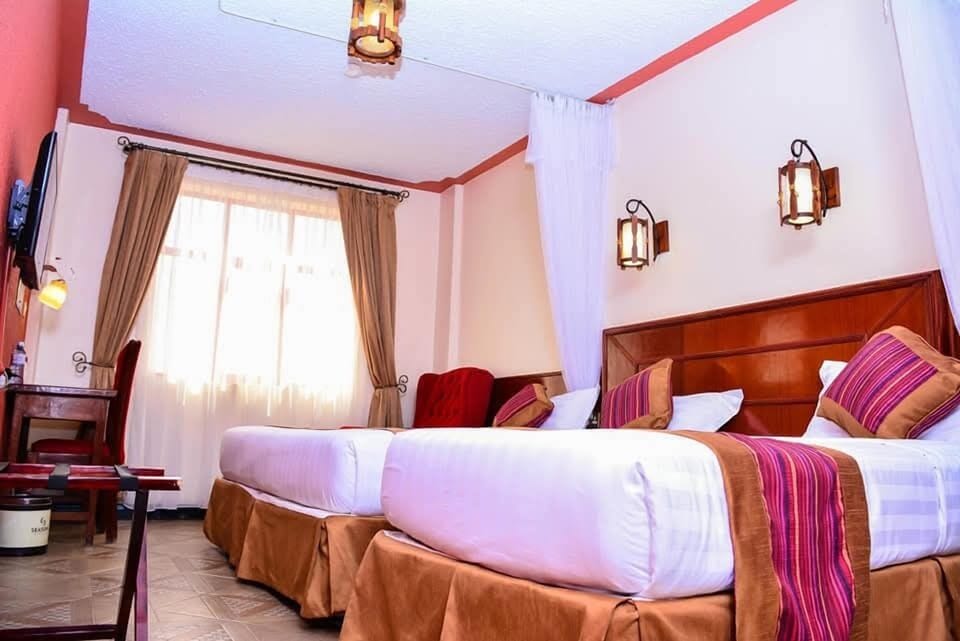 Deluxe Double or Twin Room, City View | Iron/ironing board, free WiFi, bed sheets