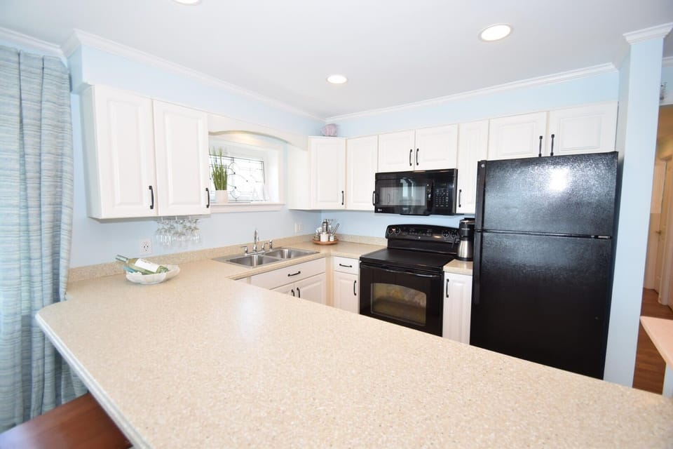 Condo, 2 Bedrooms | Private kitchen | Fridge, coffee/tea maker, toaster