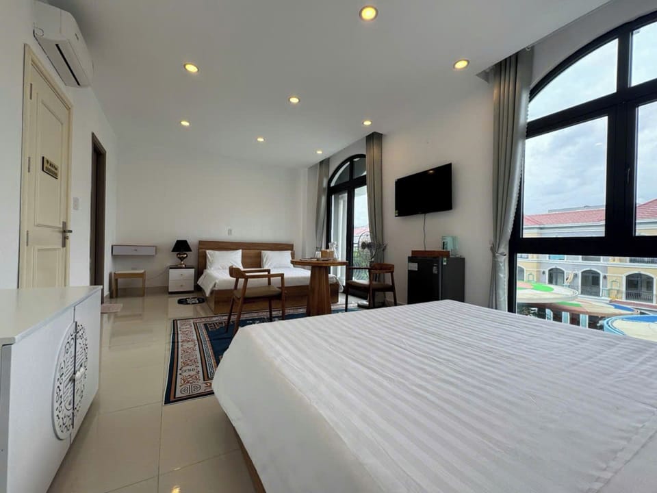 Standard Quadruple Room, Balcony, Garden View | Desk, free WiFi, bed sheets