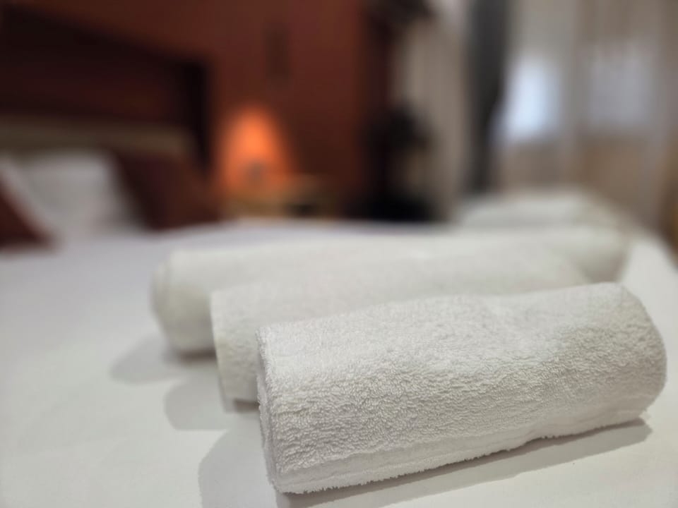 Luxury Triple Room | Bathroom amenities | Shower, hair dryer, bathrobes, towels