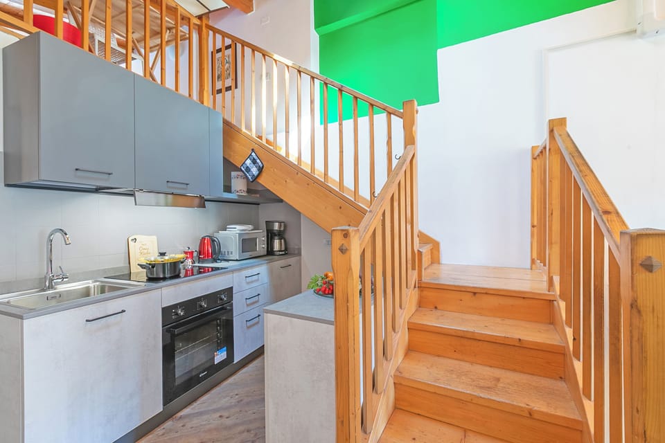 Family Apartment, Multiple Bedrooms (Nido dell'Usignolo) | Private kitchen | Fridge, microwave, stovetop, coffee/tea maker