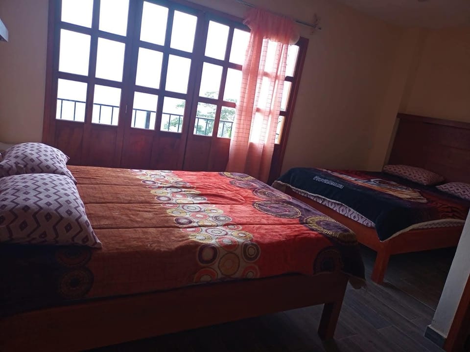 Comfort Twin Room, Pool View | Desk, laptop workspace, blackout drapes, free WiFi