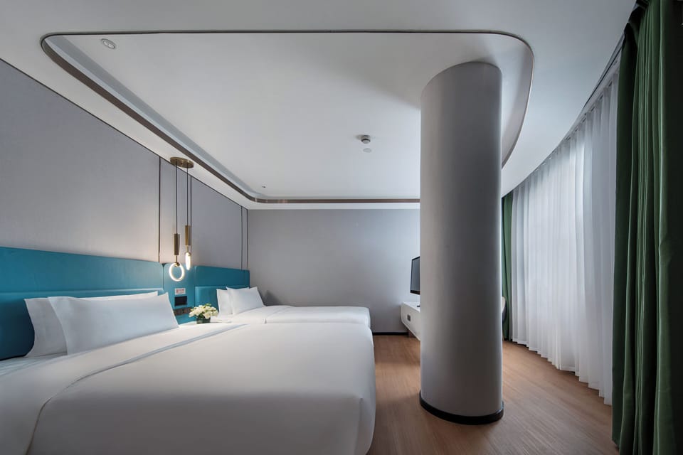 Family Twin Room, City View | Egyptian cotton sheets, premium bedding, free minibar, in-room safe