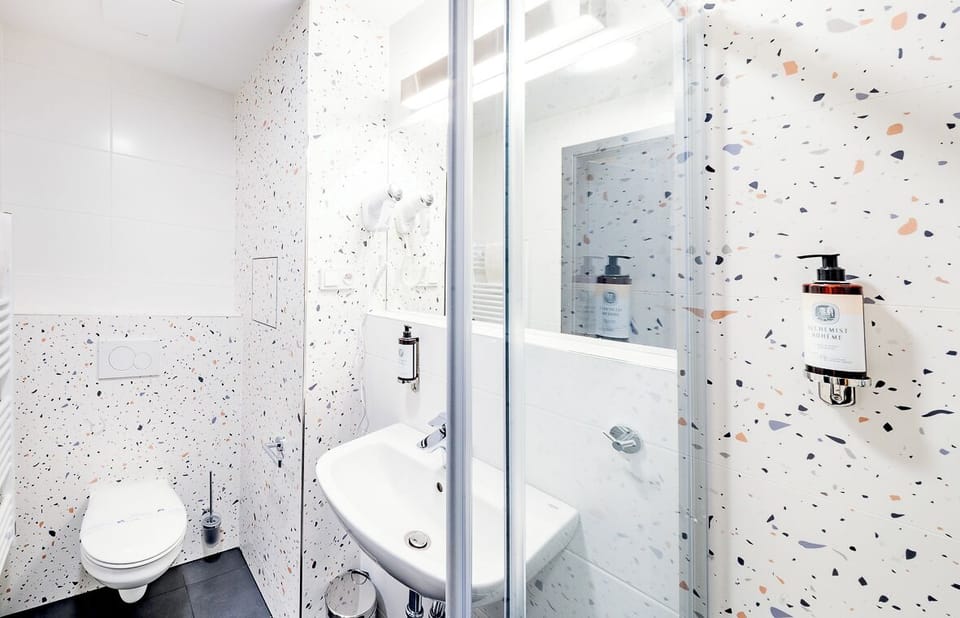 Shower, free toiletries, hair dryer, towels