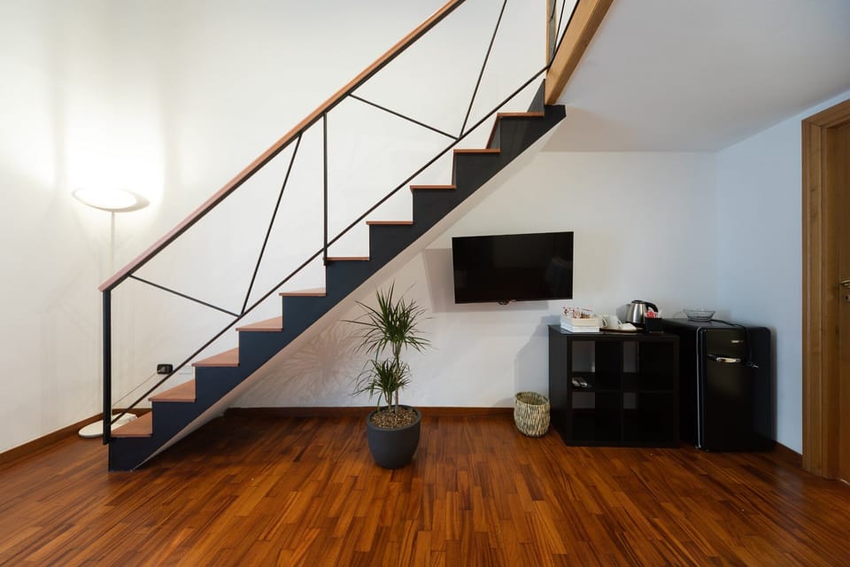 Royal Triple Room, Balcony, City View | Minibar (some free items), soundproofing, WiFi (free)
