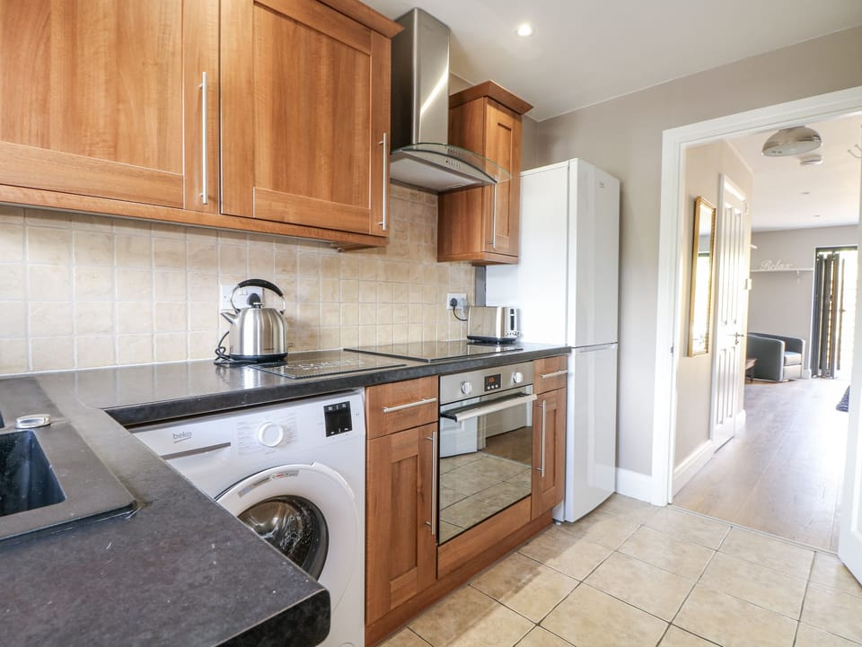Fridge, microwave, toaster, cookware/dishes/utensils