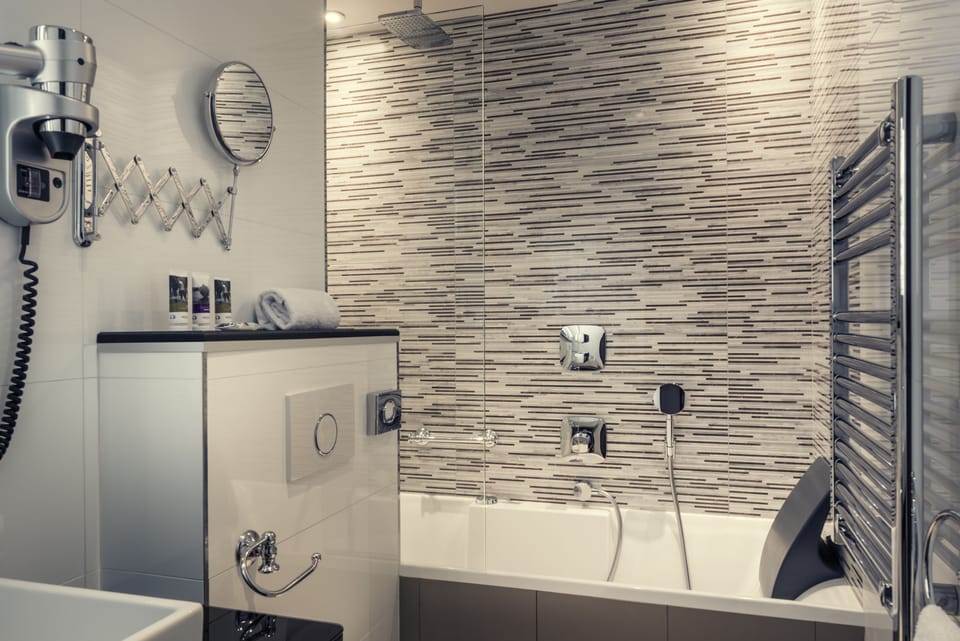 Shower, rainfall showerhead, eco-friendly toiletries, hair dryer