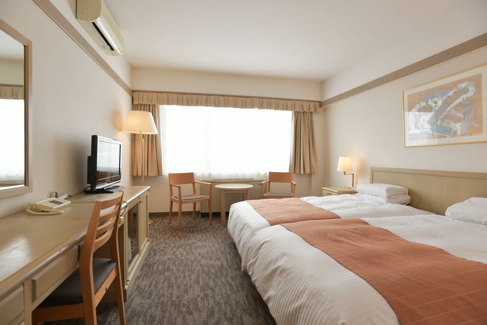 Standard Twin Room | In-room safe, desk, iron/ironing board, free WiFi