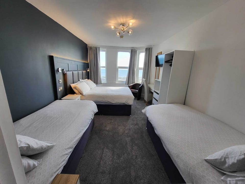 Family Room, Sea View | Iron/ironing board, free WiFi, bed sheets