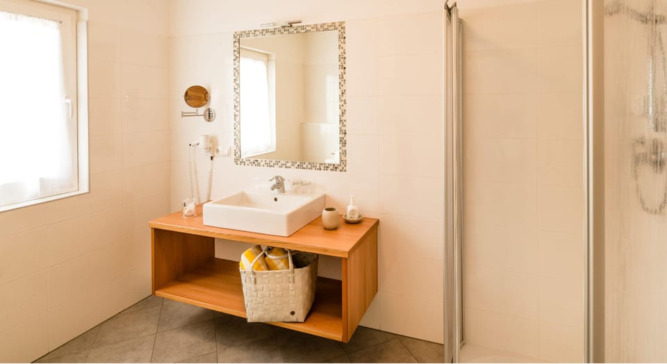 Shower, free toiletries, hair dryer, bathrobes