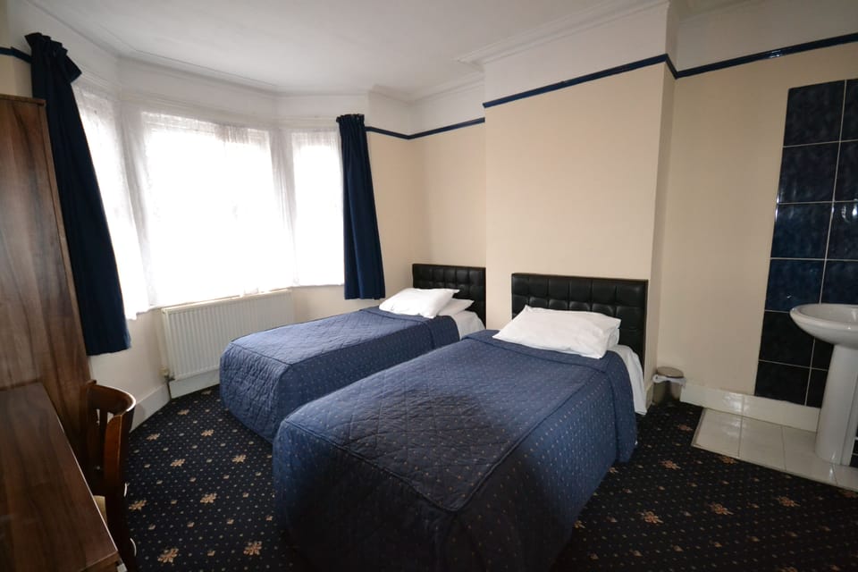 Twin Room | Desk, soundproofing, iron/ironing board, free cribs/infant beds