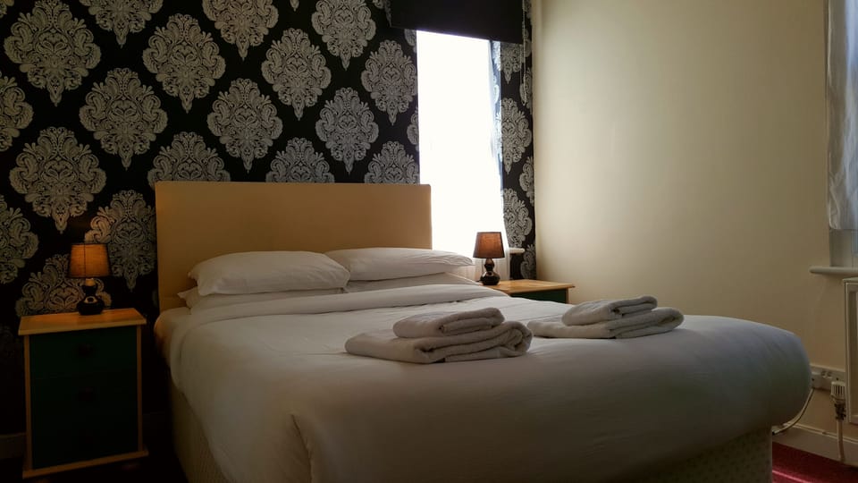 Standard Double Room | Desk, blackout drapes, WiFi (free), bed sheets