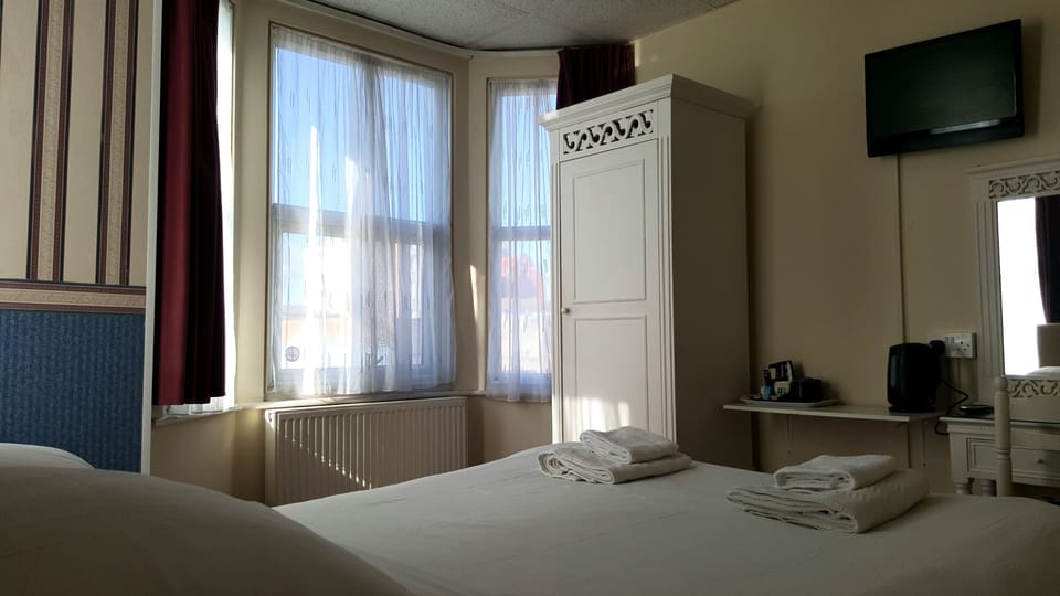 Standard Double Room | Desk, blackout drapes, WiFi (free), bed sheets