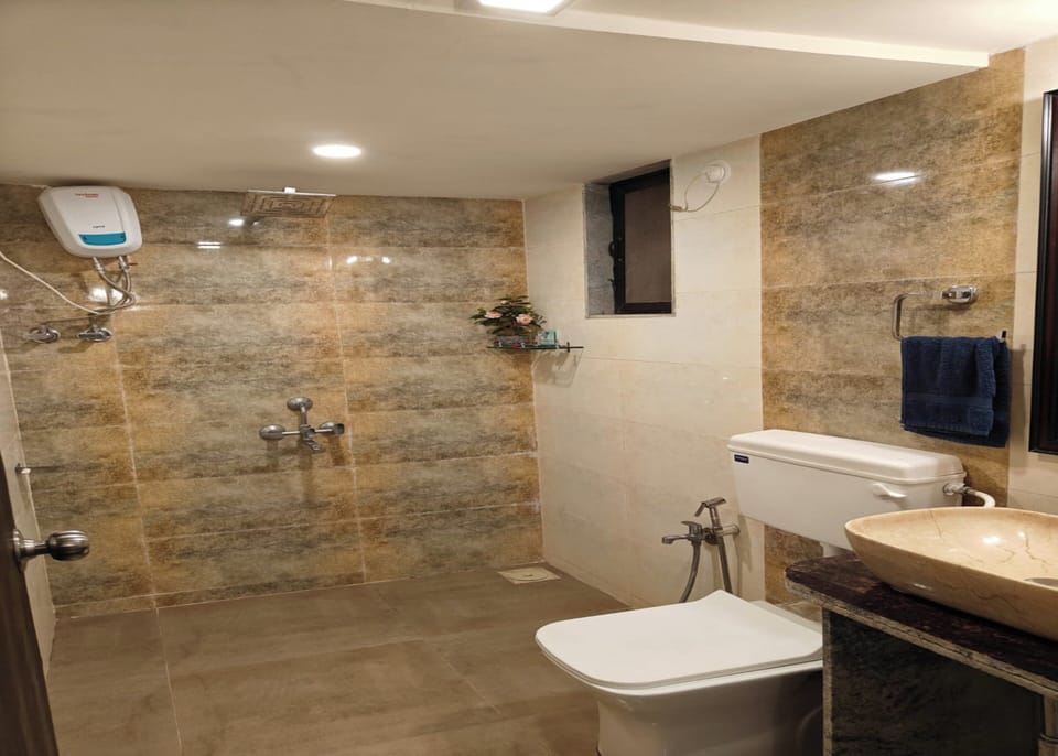Family Double Room, Garden View | Bathroom | Hair dryer, towels, soap, shampoo