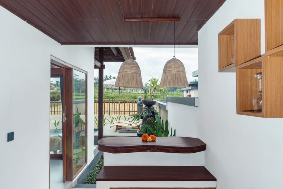 Deluxe Villa, Balcony, Pool View | Private kitchen | Mini-fridge, microwave, stovetop, electric kettle