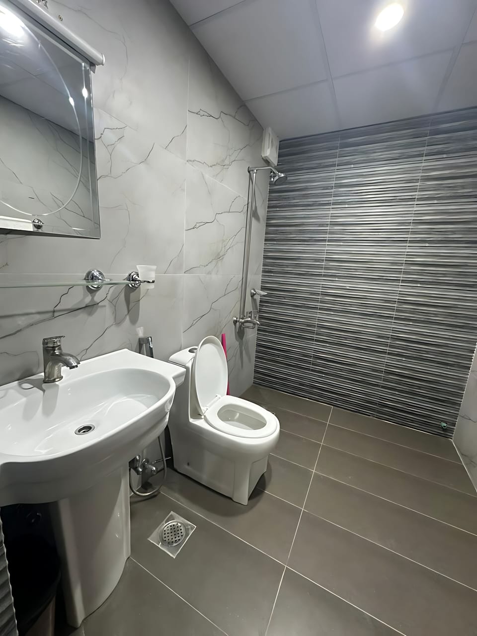 Shower, bathrobes, slippers, bidet