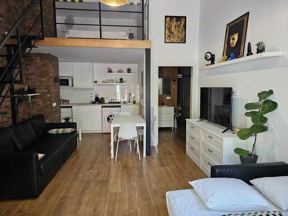 Family Apartment, Non Smoking | Living area | 50-inch Smart TV with digital channels, Netflix, streaming services