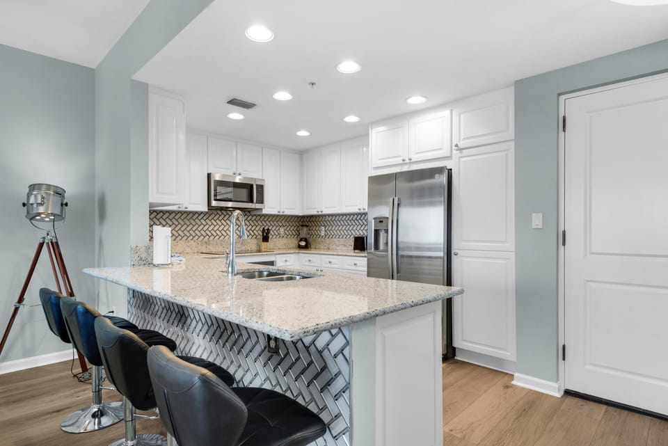 Condo, Multiple Beds (Portofino Island Resort 1-1205) | Private kitchen | Oven, toaster