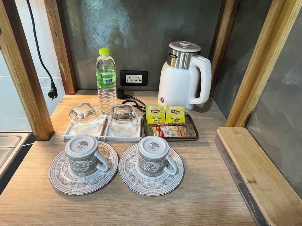 Deluxe Suite, River View | Coffee and/or coffee maker