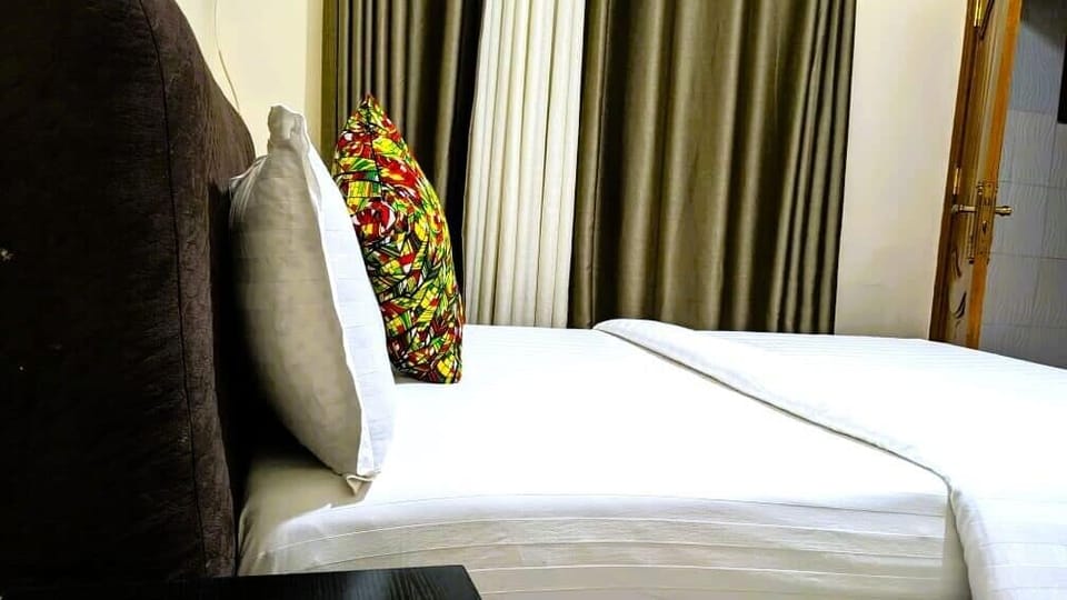 Deluxe Double Room, Hill View | Hypo-allergenic bedding available, memory foam beds, in-room safe, desk