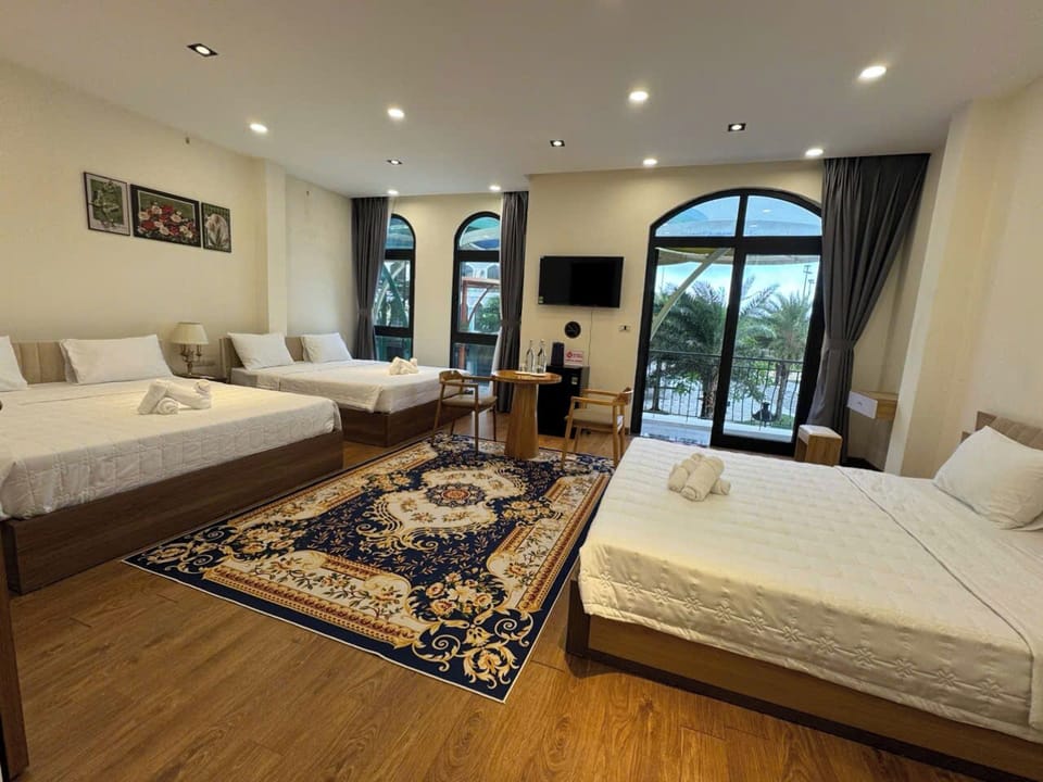 Family Room, Multiple Beds, Balcony, Garden View | Desk, free WiFi, bed sheets
