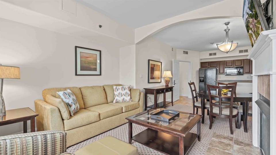 Condo, Multiple Beds, Balcony (Avila Serenity Suite) | Living area | 42-inch flat-screen TV with digital channels, fireplace