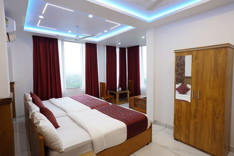 Deluxe Quadruple Room, Balcony | Free WiFi