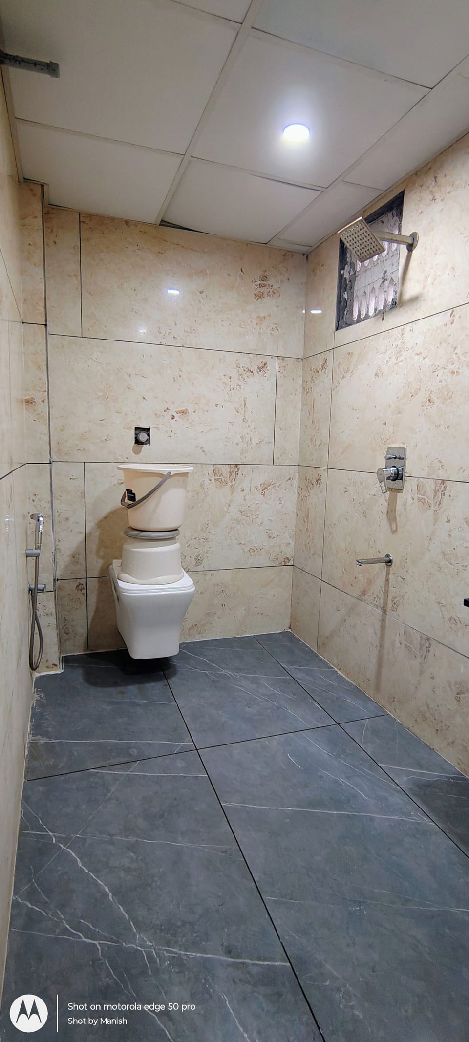 Economy Room | Bathroom | Combined shower/tub, slippers, towels, soap