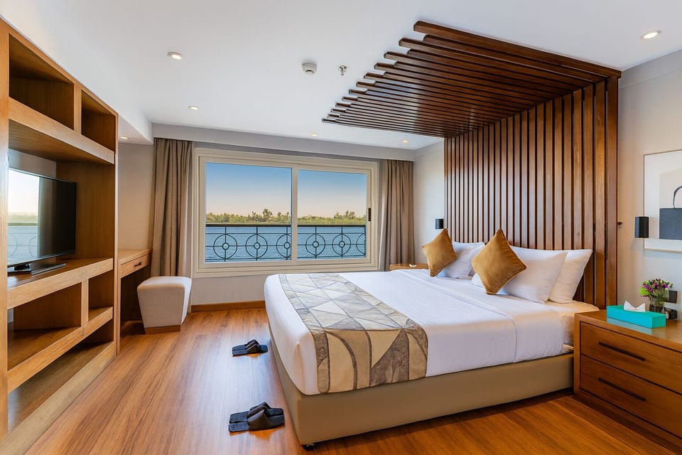 Deluxe Suite, River View | In-room safe, blackout drapes, soundproofing
