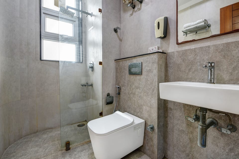 Deluxe Double or Twin Room, Garden View | Bathroom | Shower, towels, soap, toilet paper