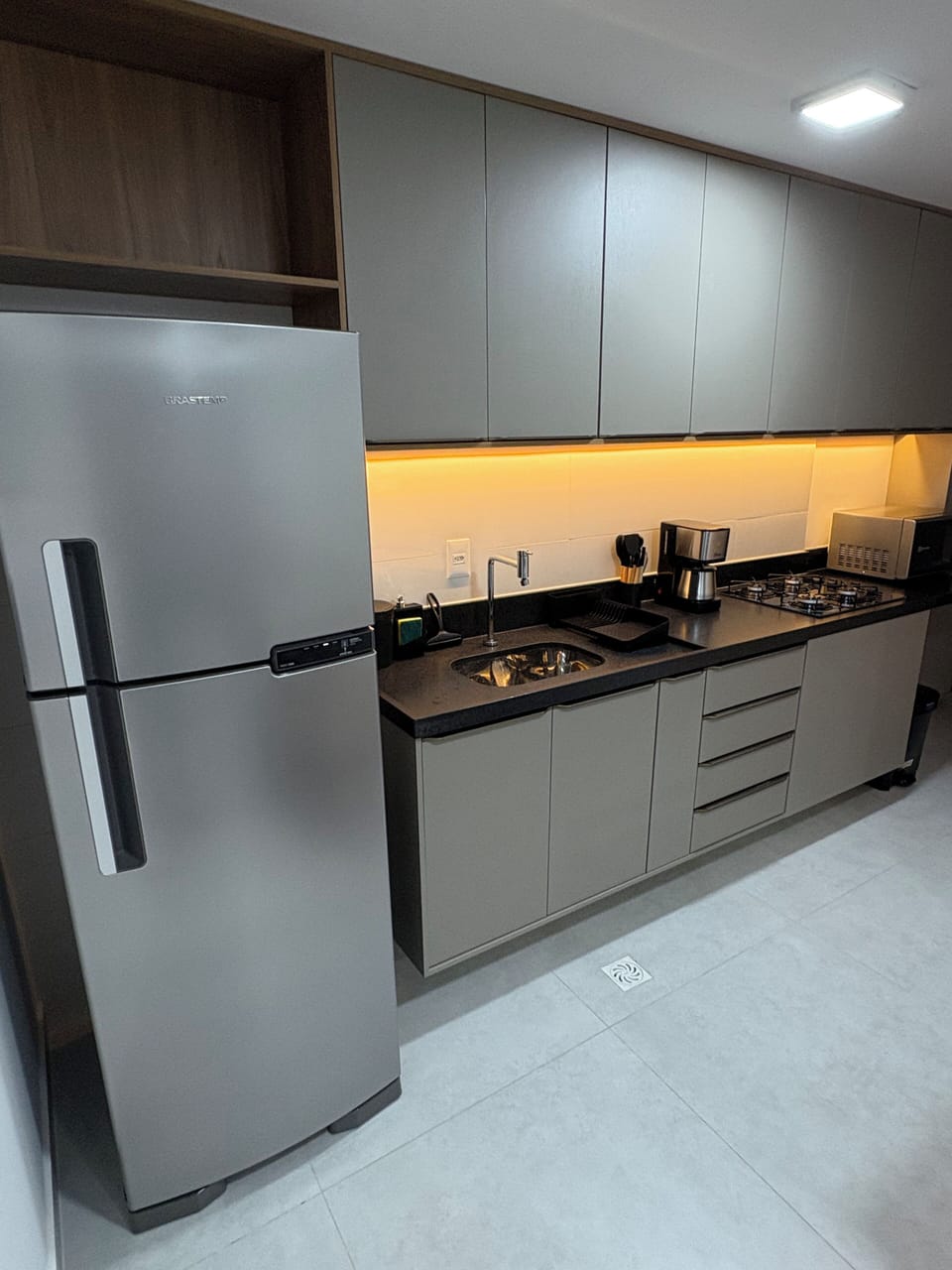 Apartment | Private kitchen | Fridge, microwave, stovetop, cookware/dishes/utensils