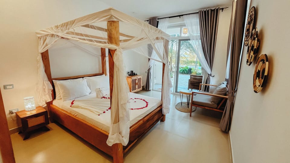 Deluxe Suite, Pool View | Premium bedding, pillowtop beds, free minibar items, in-room safe