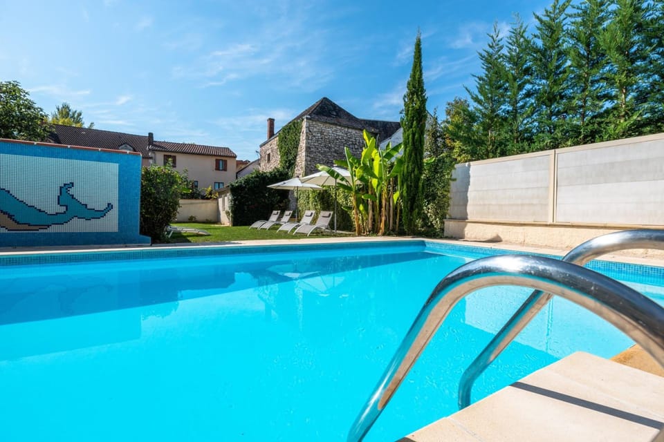Outdoor pool, open 9:00 AM to 8:00 PM, sun loungers