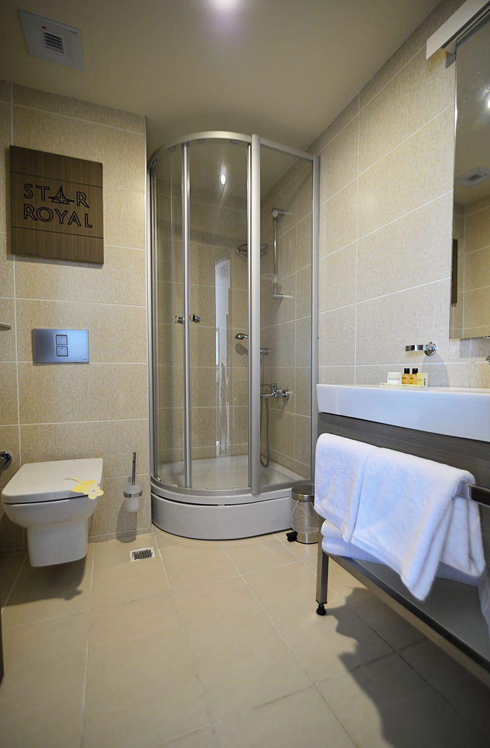 Shower, free toiletries, hair dryer, slippers