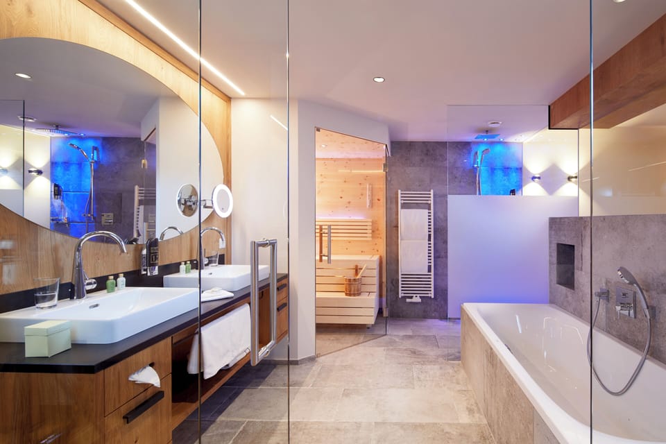 Wellness Suite | Bathroom | Free toiletries, hair dryer, slippers, towels