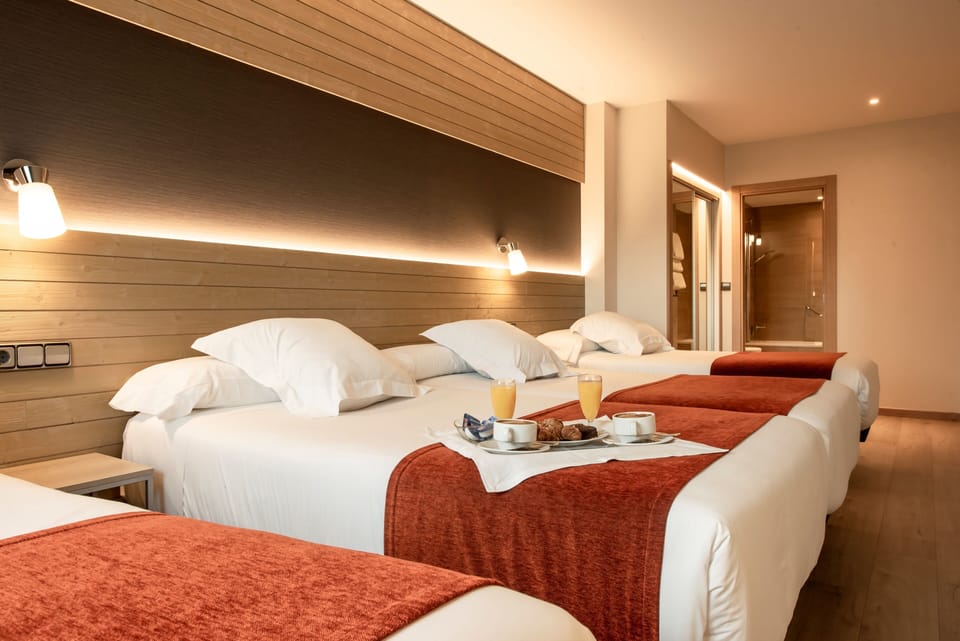 Family Room | Egyptian cotton sheets, premium bedding, down comforters