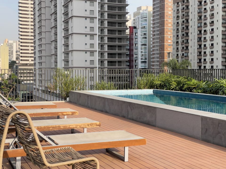Outdoor pool, pool umbrellas, sun loungers