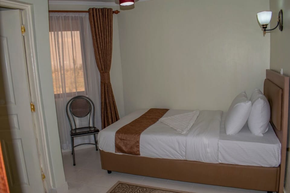 Deluxe Double Room, Garden View | Free WiFi, bed sheets