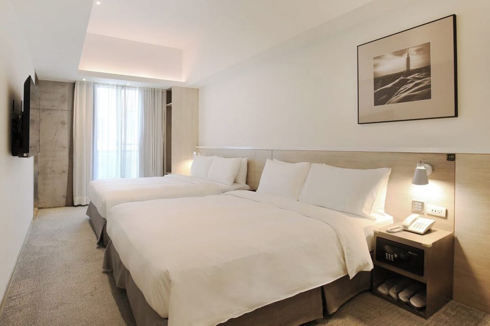 Family Room | Down comforters, in-room safe, desk, blackout drapes