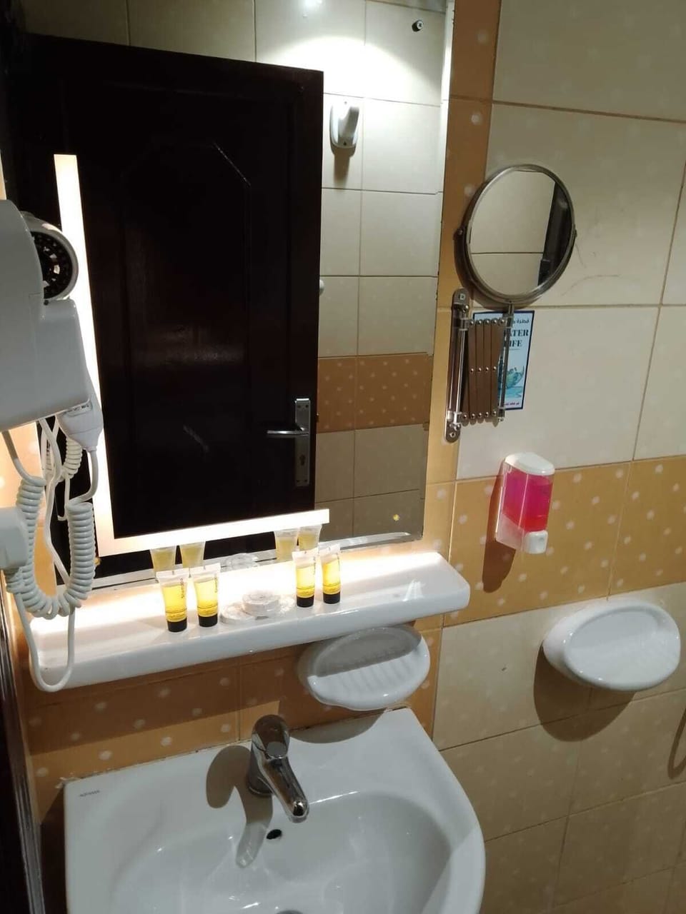 Hair dryer, bidet, towels, soap