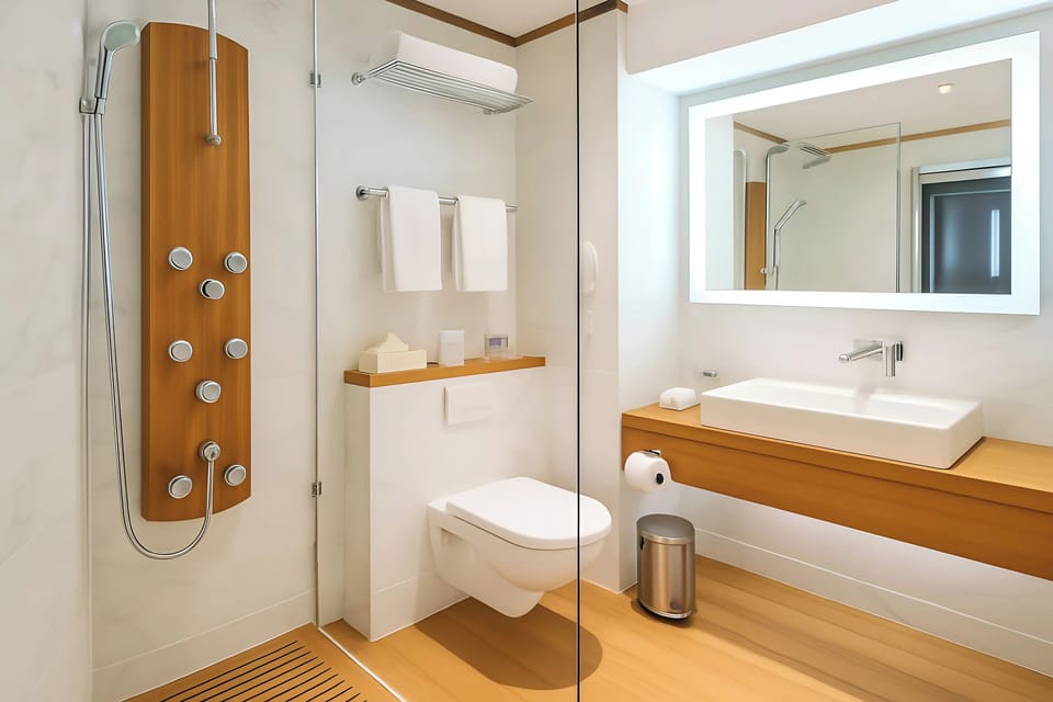 Combined shower/tub, hair dryer, towels, soap