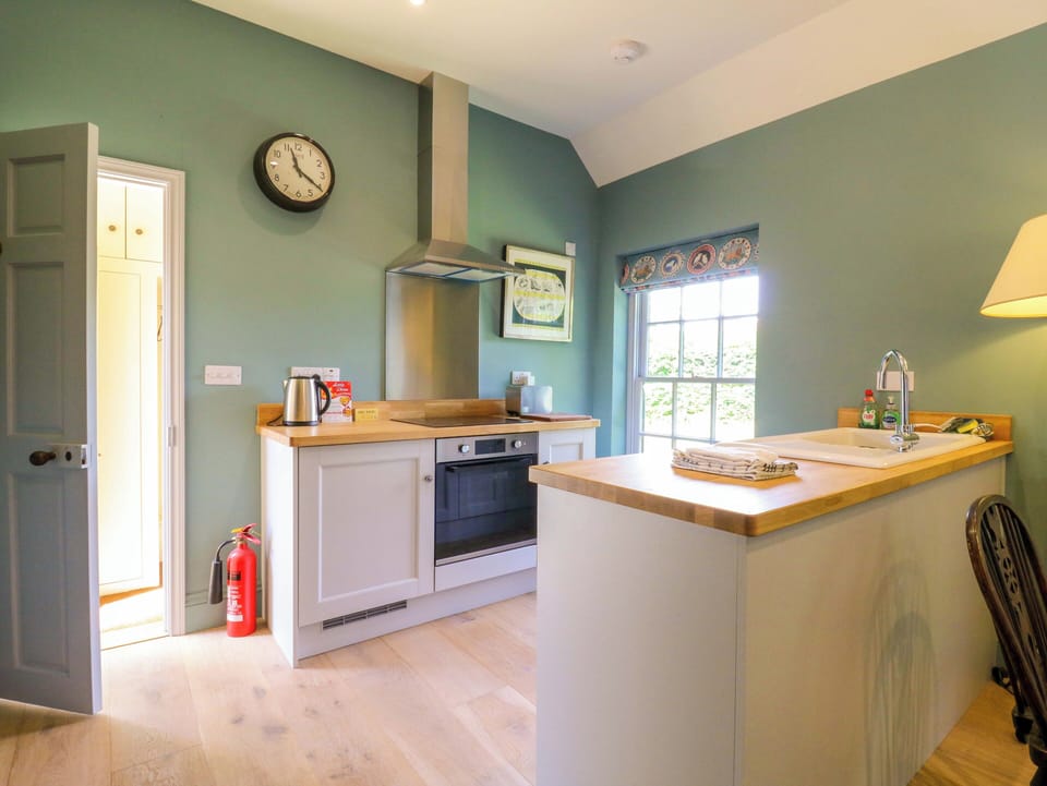 Fridge, toaster, cookware/dishes/utensils