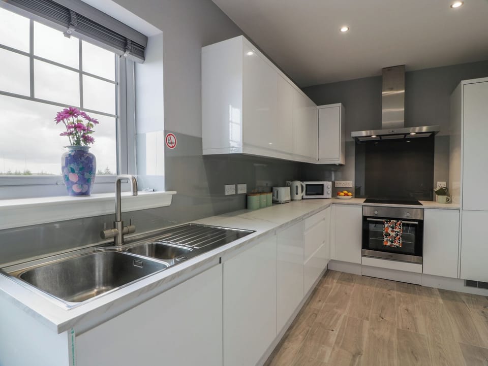 Fridge, microwave, toaster, cookware/dishes/utensils