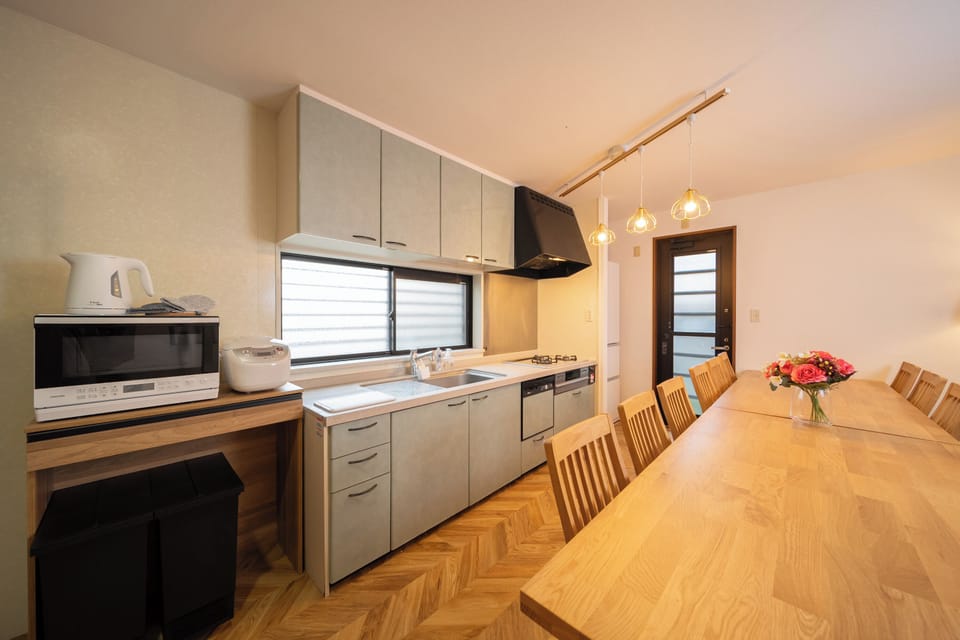 Comfort Condo, Non Smoking | Private kitchen | Full-size fridge, microwave, stovetop, cookware/dishes/utensils