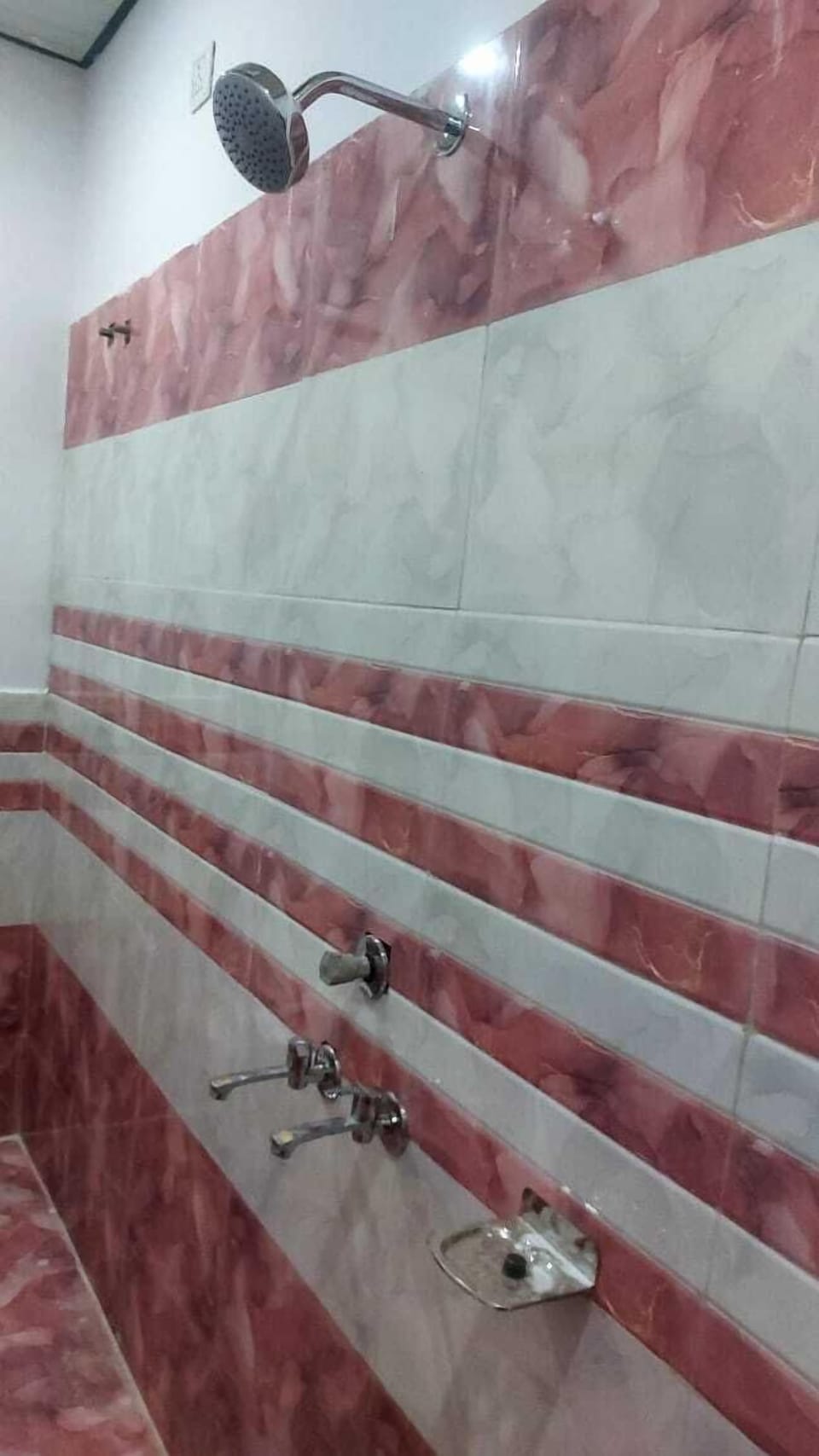 Shower, free toiletries, slippers, towels
