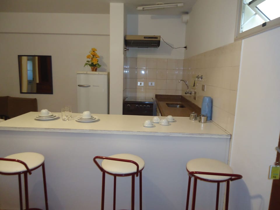 Fridge, stovetop, cookware/dishes/utensils