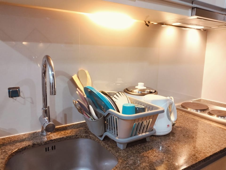 Double Room, City View | Private kitchen | Mini-fridge, stovetop, cookware/dishes/utensils
