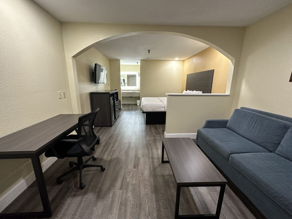 Desk, blackout drapes, soundproofing, iron/ironing board